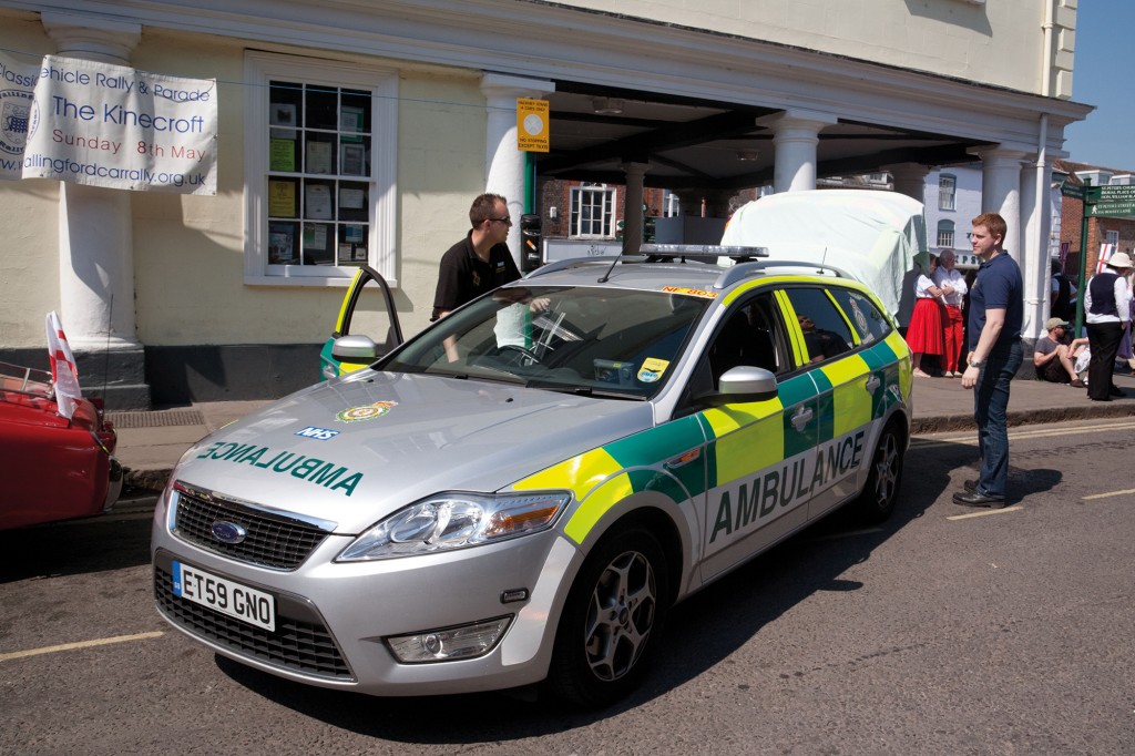 C3B3BG A paramedic setting up at the town fair, Wallingford, Oxfordshire UK