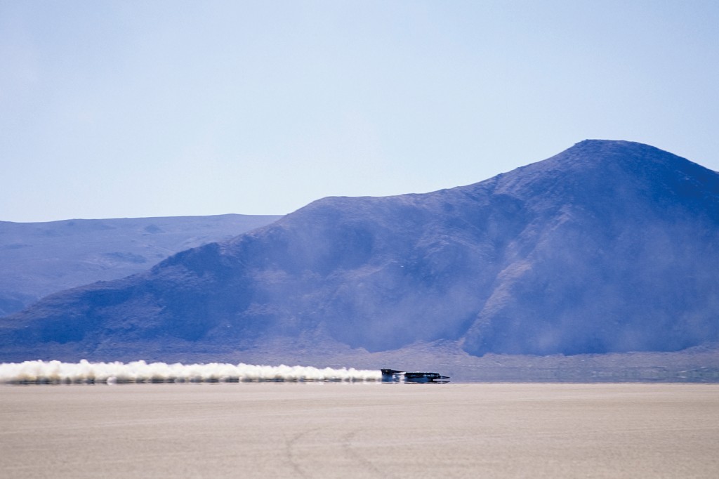 BLACK ROCK DESERT, NV - SEPTEMBER 1997:  The Thrust SSC car makes a speed run in September 1997 in the Black Rock Desert north of Reno, Nevada.  The car eventually set a series of land speed records, culminating in the first supersonic land speed record of 763 mph.  (Photo by David Madison/Getty Images)